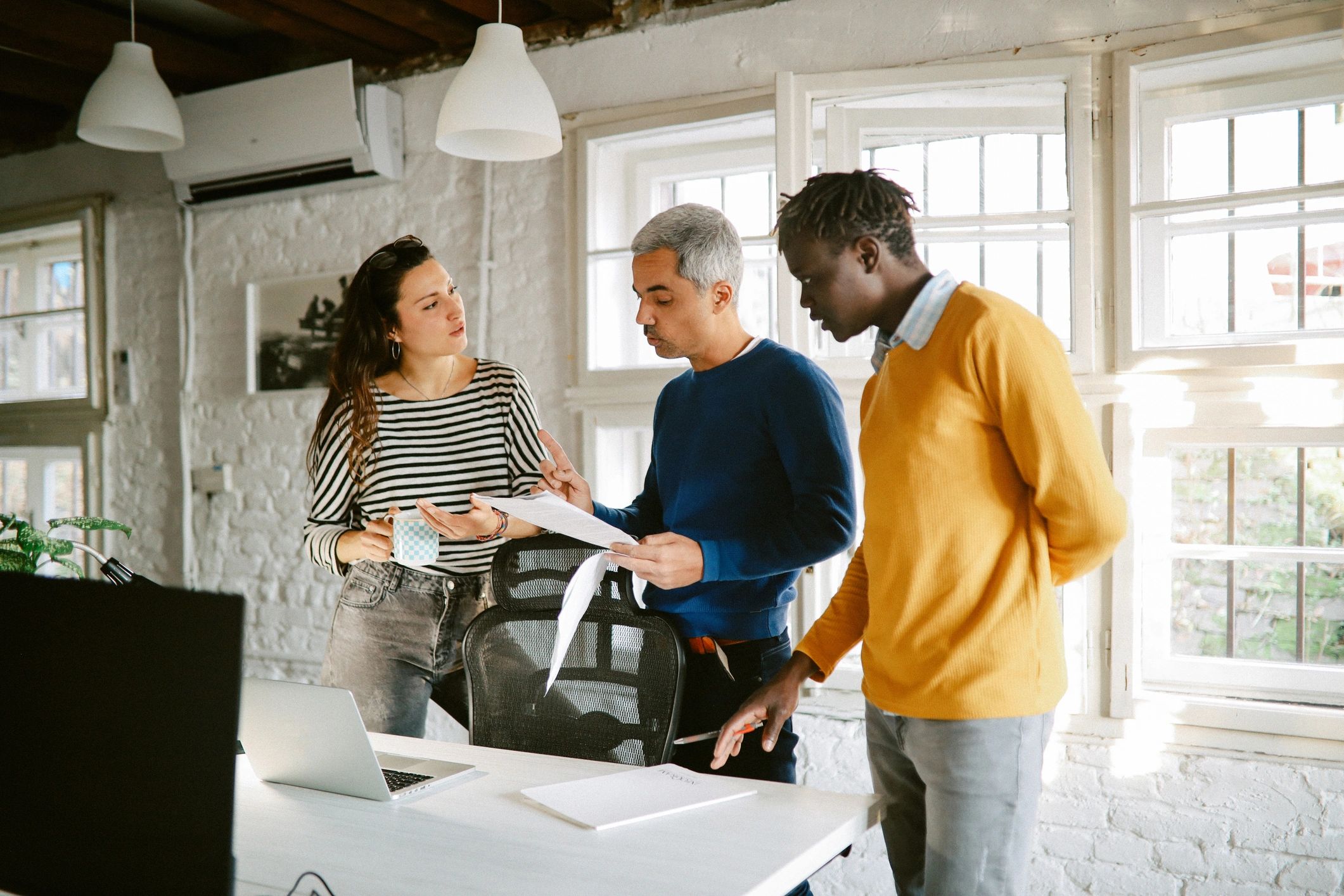 Design professionals working together in a modern office