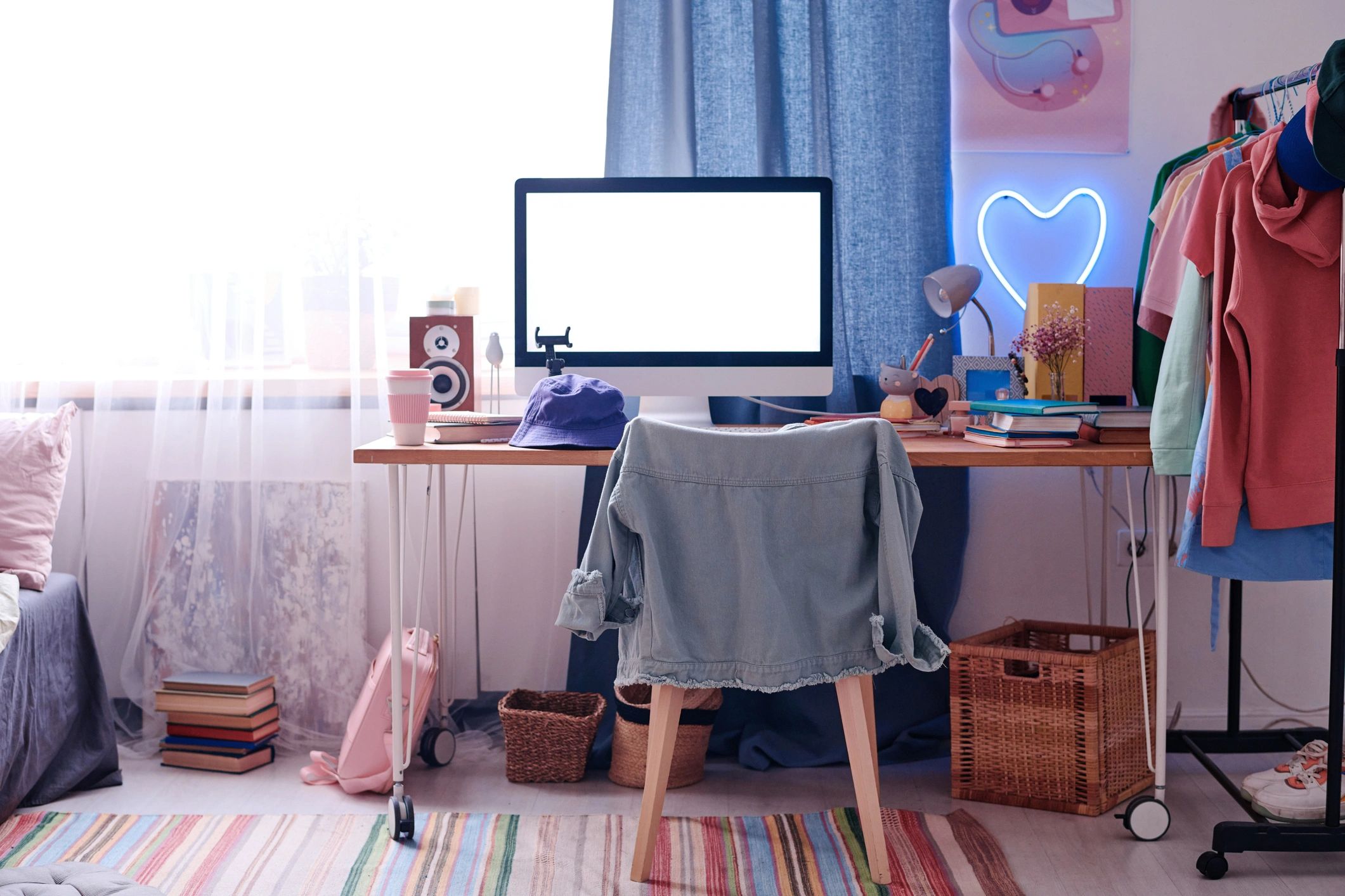 Modern laptop workspace displaying a website design setup