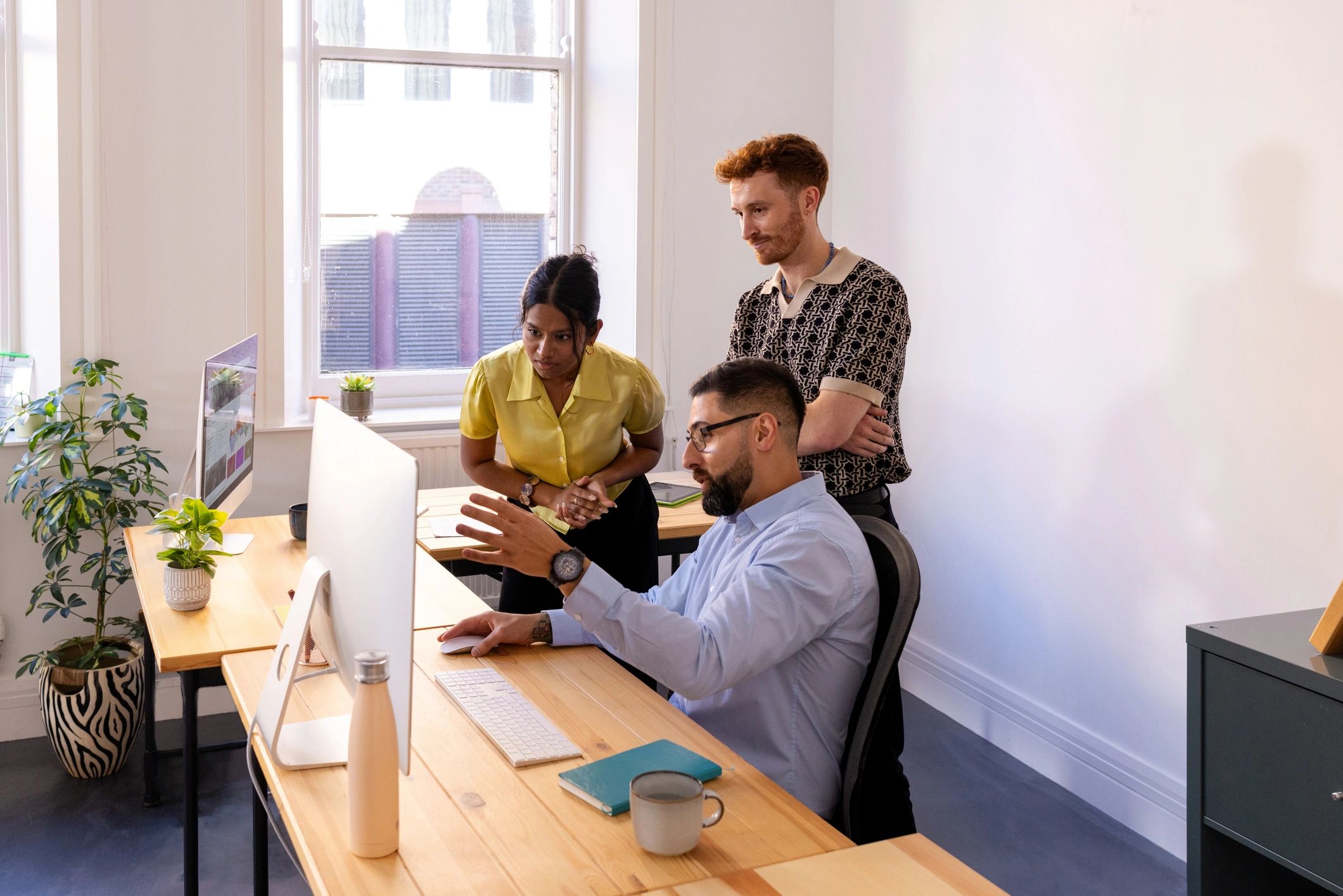 Ontario Trade Websites team collaborating in a modern office